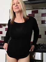 Elegant Laura Gets Naughty in the Kitchen
