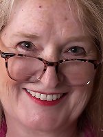 Curvy GILF Maggie in Pink Robe & White Lingerie